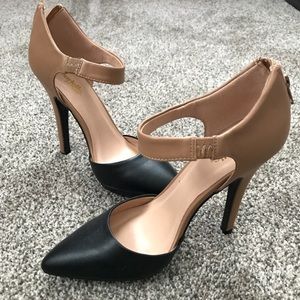Brown and black pumps